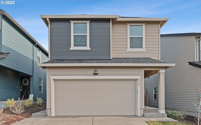 front of property with a garage