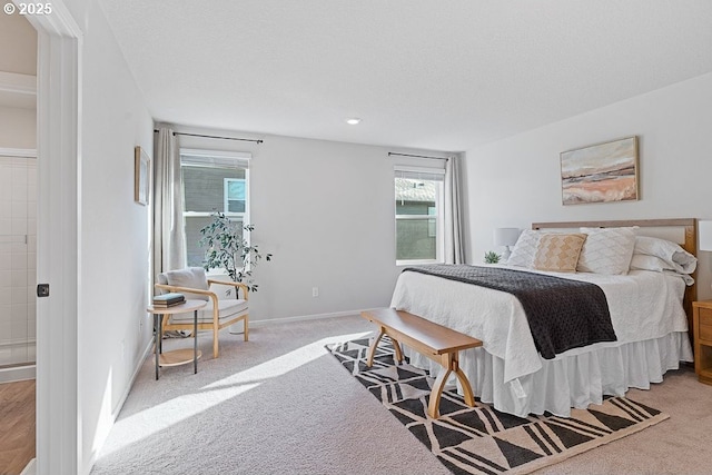 carpeted bedroom with a textured ceiling