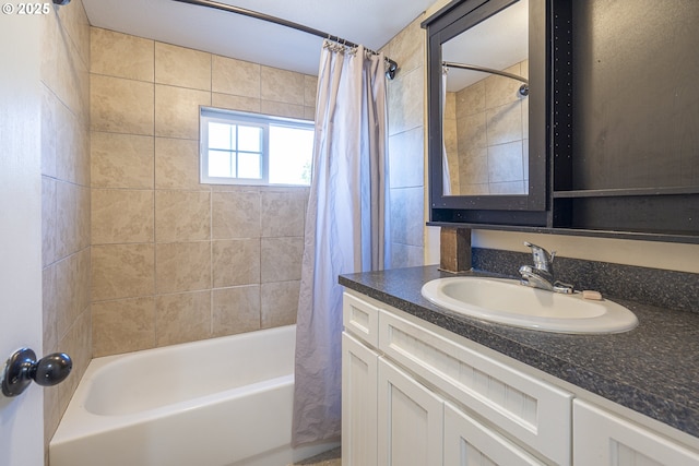 bathroom featuring shower / tub combo with curtain and vanity