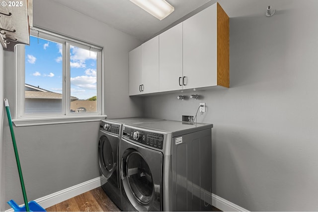 15263 Oceanview Dr, Brookings, OR 97415 - washroom with washing machine and clothes dryer, cabinet space, and dark wood finished floors