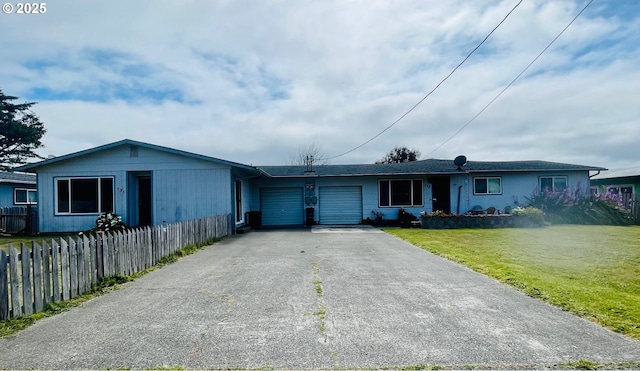 755735 Bluff Ave, Bandon, OR 97411 - ranch-style house featuring asphalt driveway and a garage