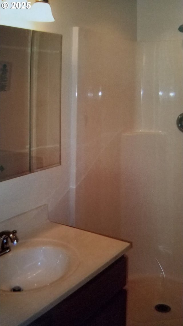 755735 Bluff Ave, Bandon, OR 97411 - full bathroom featuring vanity and a shower