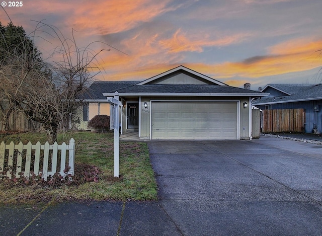 ranch-style home with a garage