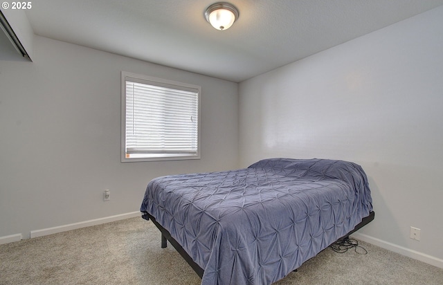 bedroom with light colored carpet