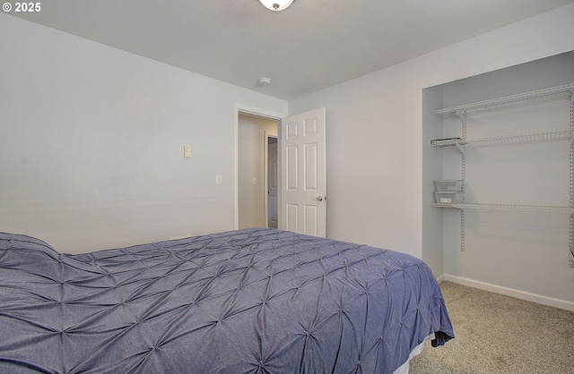 bedroom featuring carpet