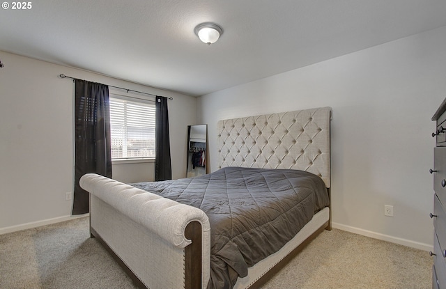 bedroom featuring light carpet