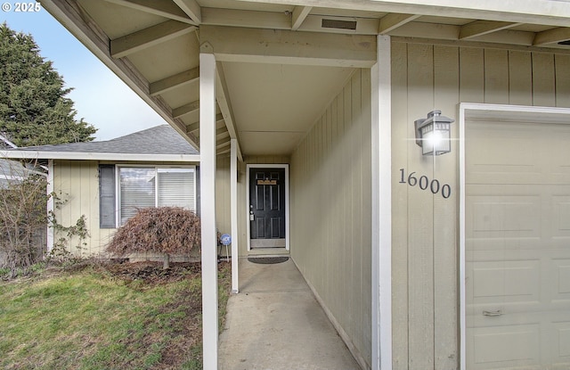 entrance to property featuring a garage