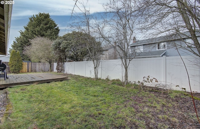 view of yard featuring a deck