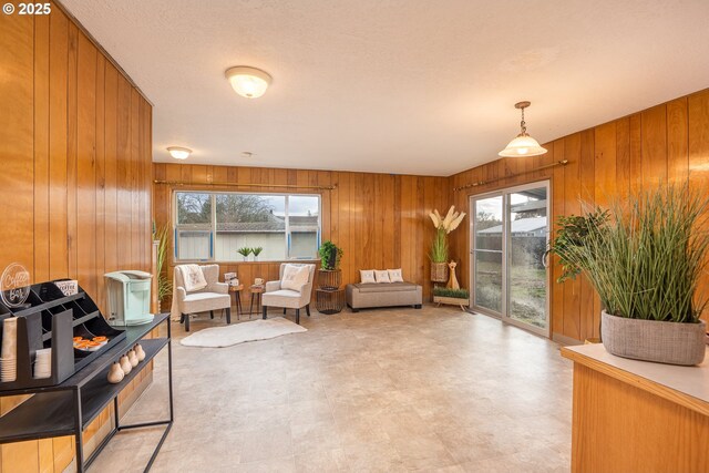 4160 Willhi St, Eugene, OR 97402 - sitting room with wooden walls and a healthy amount of sunlight