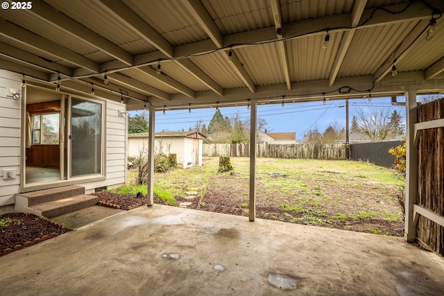 view of patio / terrace featuring an outbuilding