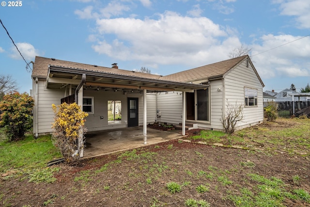 back of house featuring a patio area