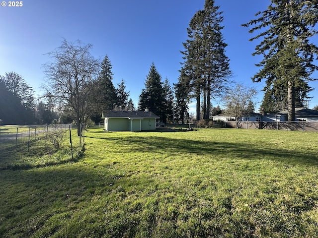 view of yard featuring fence