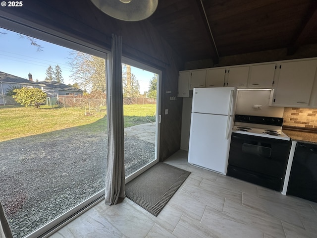 kitchen featuring white cabinetry, black dishwasher, range with electric cooktop, and freestanding refrigerator