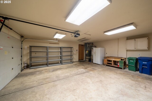 garage with white fridge with ice dispenser and a garage door opener