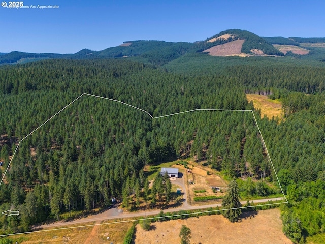 94986 Thetford Ln, Marcola, OR 97454 - aerial overview of property's location with a heavily wooded area, mountains, and property parcel outlined