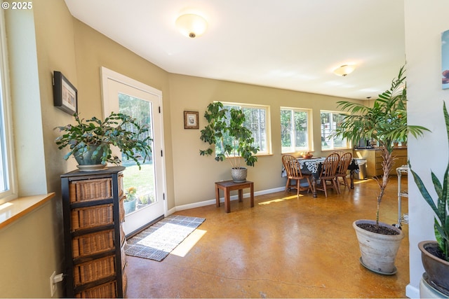 94986 Thetford Ln, Marcola, OR 97454 - entryway featuring finished concrete floors and baseboards