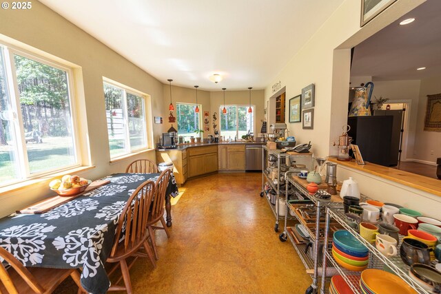 94986 Thetford Ln, Marcola, OR 97454 - dining room featuring finished concrete flooring, plenty of natural light, and recessed lighting