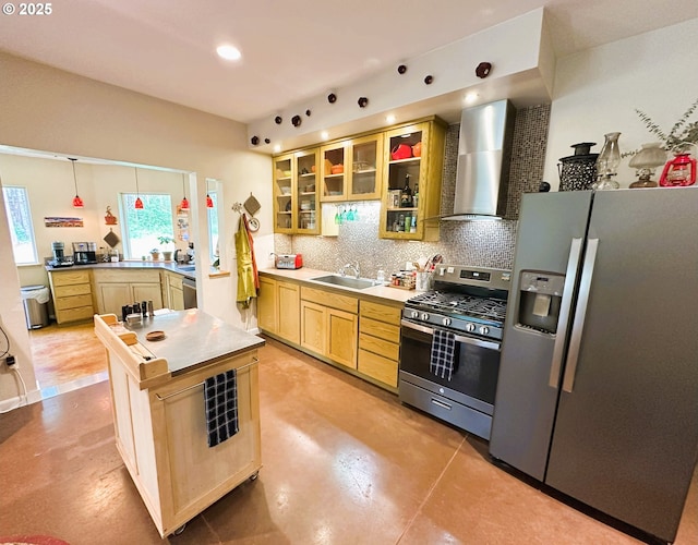 94986 Thetford Ln, Marcola, OR 97454 - kitchen featuring stainless steel appliances, wall chimney exhaust hood, a sink, backsplash, and glass insert cabinets