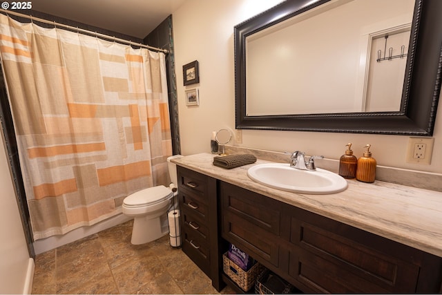 94986 Thetford Ln, Marcola, OR 97454 - bathroom featuring toilet, stone finish flooring, vanity, and curtained shower