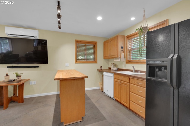 86680 Territorial Hwy, Veneta, OR 97487 - kitchen with black fridge with ice dispenser, white dishwasher, a wall unit AC, wooden counters, and a sink