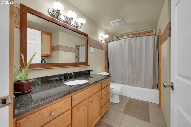 86680 Territorial Hwy, Veneta, OR 97487 - full bath featuring toilet, vanity, tile patterned flooring, and shower / tub combo with curtain