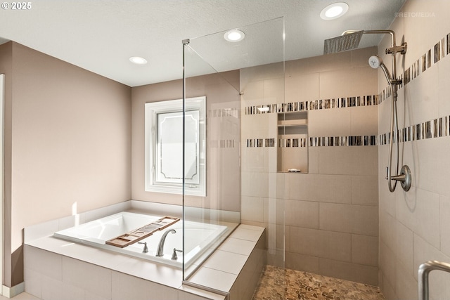 bathroom with tiled shower, a garden tub, and recessed lighting