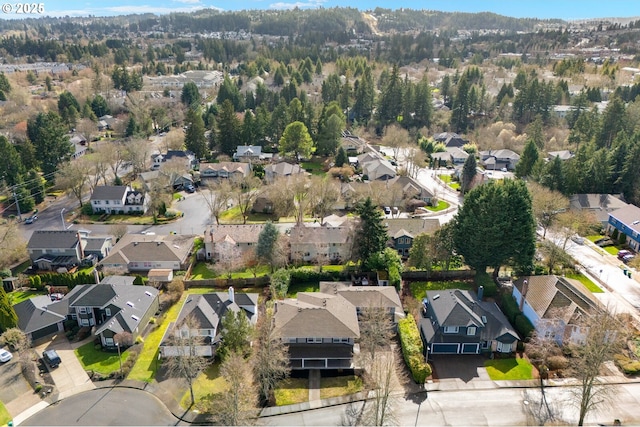 birds eye view of property with a residential view