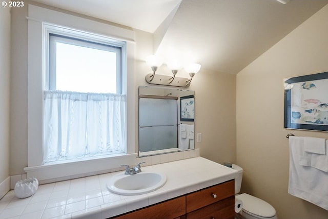 1603 Berkeley Ln, Monmouth, OR 97361 - bathroom with vanity, toilet, and lofted ceiling