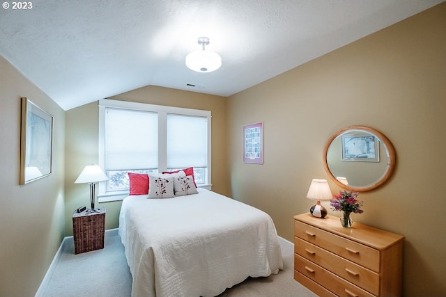 1603 Berkeley Ln, Monmouth, OR 97361 - bedroom with light carpet, lofted ceiling, and baseboards