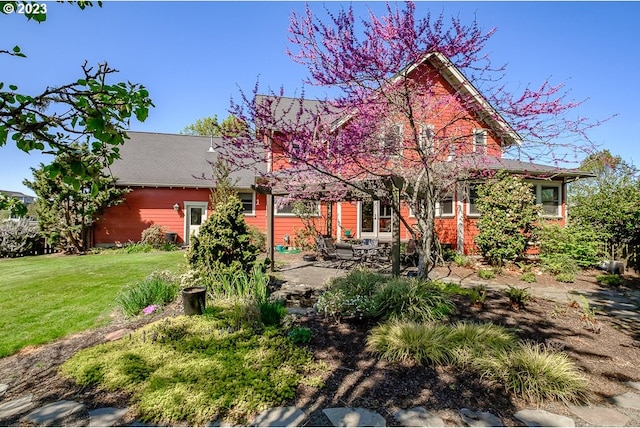 1603 Berkeley Ln, Monmouth, OR 97361 - rear view of property featuring a patio and a lawn
