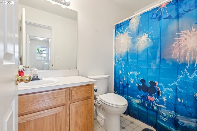 19030 SW Pike Ln, Beaverton, OR 97078 - full bathroom featuring toilet, vanity, a shower with curtain, and tile patterned flooring