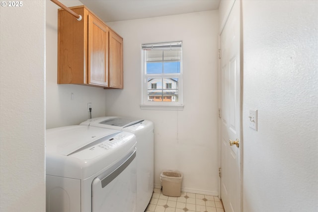 19030 SW Pike Ln, Beaverton, OR 97078 - washroom featuring cabinet space, independent washer and dryer, and baseboards