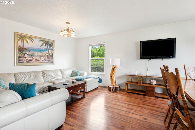 19030 SW Pike Ln, Beaverton, OR 97078 - living room featuring a chandelier and wood finished floors