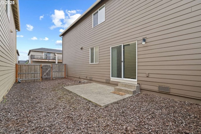 2344 SE 16th Aly, Gresham, OR 97080 - back of property featuring entry steps, a patio area, and a gate