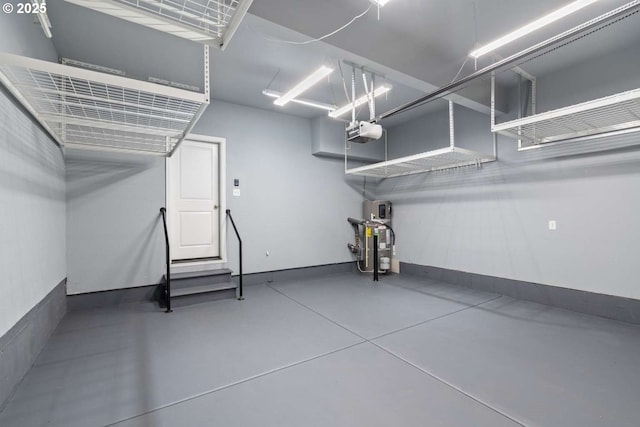 2344 SE 16th Aly, Gresham, OR 97080 - garage featuring a garage door opener and heat pump water heater