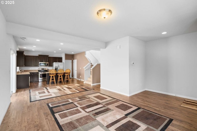 2344 SE 16th Aly, Gresham, OR 97080 - living area with light wood-style floors, recessed lighting, and stairway