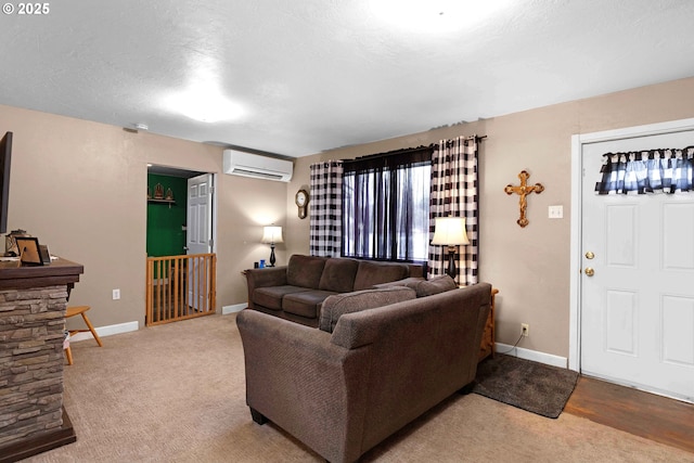 carpeted living room with a wall mounted air conditioner and a textured ceiling