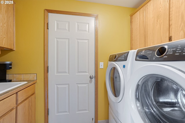 2176 SE 63rd Ave, Hillsboro, OR 97123 - washroom with cabinet space and independent washer and dryer