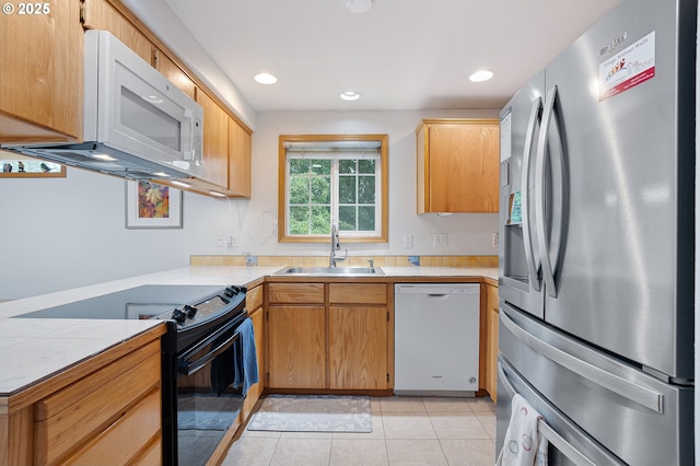 2176 SE 63rd Ave, Hillsboro, OR 97123 - kitchen with white appliances, a sink, light tile patterned floors, and recessed lighting