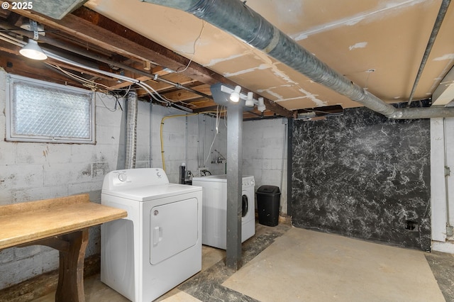 washroom with washing machine and dryer