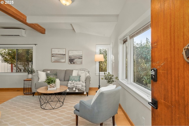 interior space with plenty of natural light, light hardwood / wood-style floors, a wall unit AC, and vaulted ceiling with beams