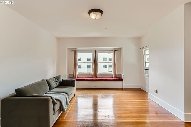 2566 NW Lovejoy St Unit 4, Portland, OR 97210 - living room with light wood-style floors and baseboards