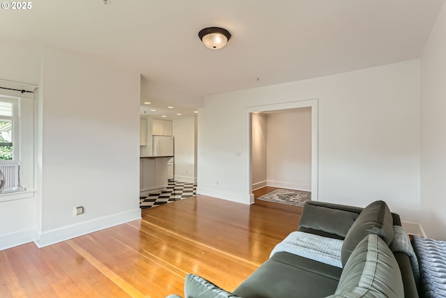 2566 NW Lovejoy St Unit 4, Portland, OR 97210 - living area with light wood finished floors and baseboards