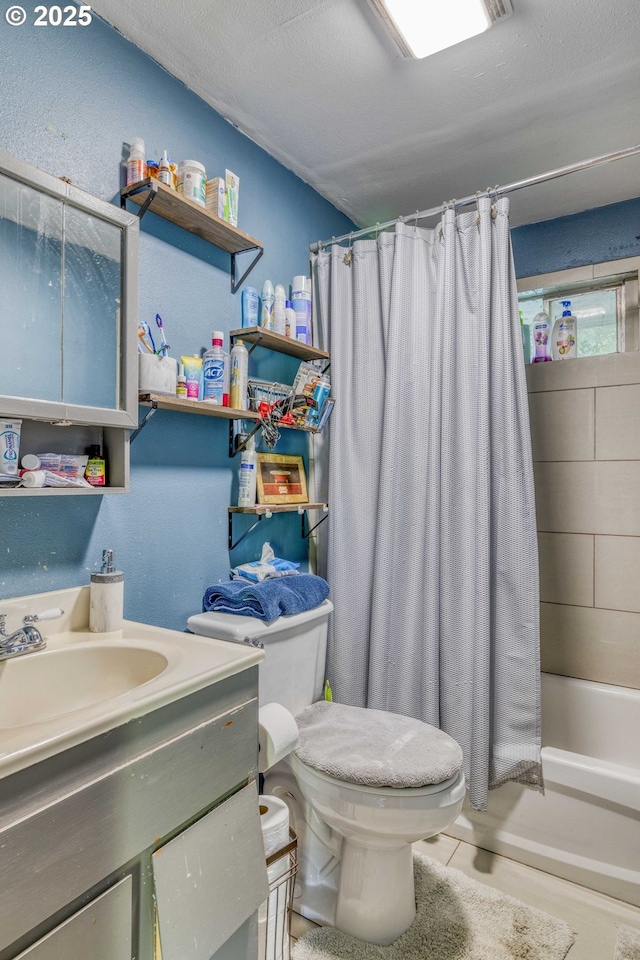 full bathroom with toilet, vanity, shower / bath combo with shower curtain, and tile patterned flooring