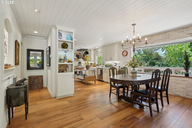 15785 SW Bull Mountain Rd, Portland, OR 97224 - dining space featuring a chandelier, light wood-type flooring, recessed lighting, and wooden ceiling