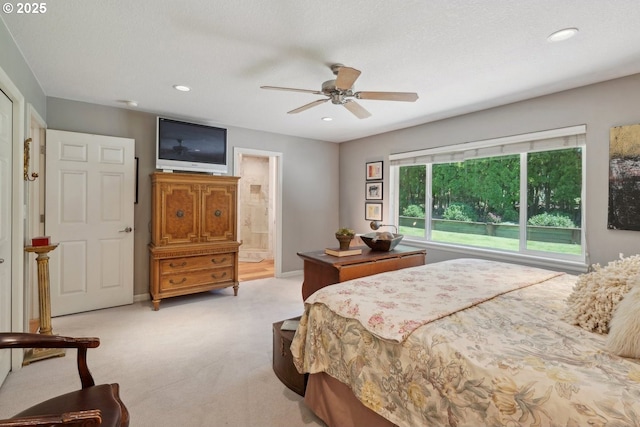 15785 SW Bull Mountain Rd, Portland, OR 97224 - bedroom featuring light colored carpet, recessed lighting, ceiling fan, baseboards, and ensuite bathroom