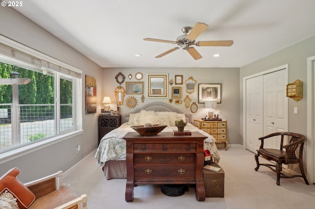 15785 SW Bull Mountain Rd, Portland, OR 97224 - bedroom featuring light colored carpet, a closet, baseboards, a ceiling fan, and recessed lighting
