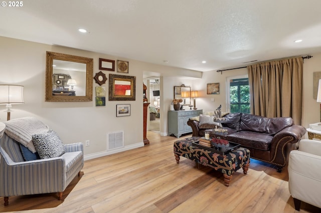 15785 SW Bull Mountain Rd, Portland, OR 97224 - living area featuring baseboards, wood finished floors, and recessed lighting