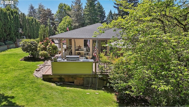 15785 SW Bull Mountain Rd, Portland, OR 97224 - back of property with a deck, a yard, and a shingled roof