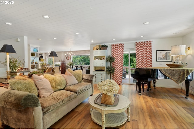 15785 SW Bull Mountain Rd, Portland, OR 97224 - living area with a chandelier, light wood-style flooring, and recessed lighting